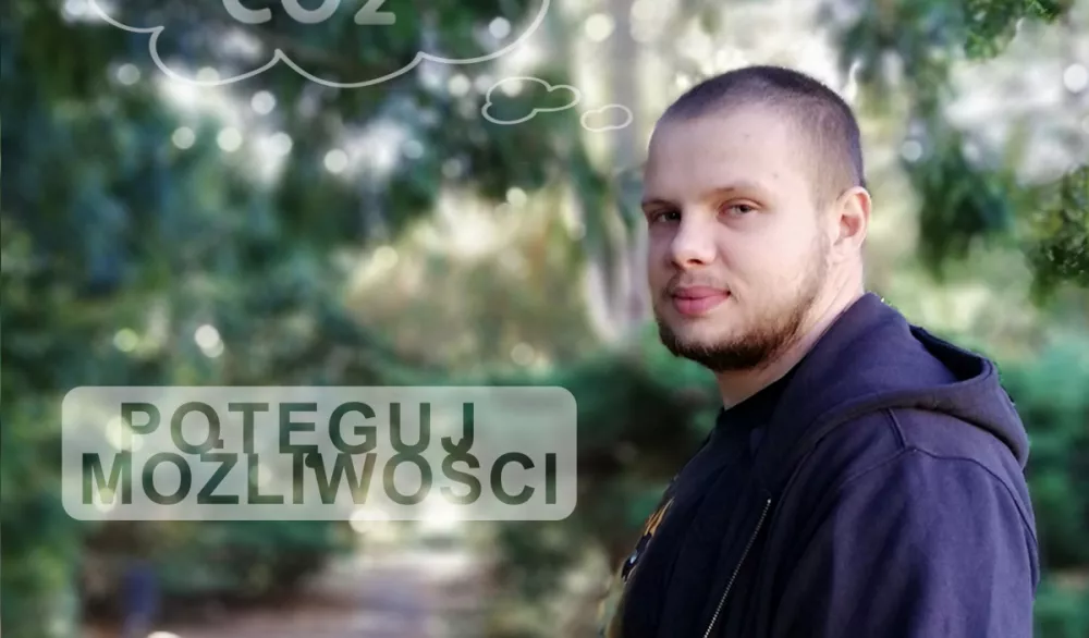 Student na tle parku.