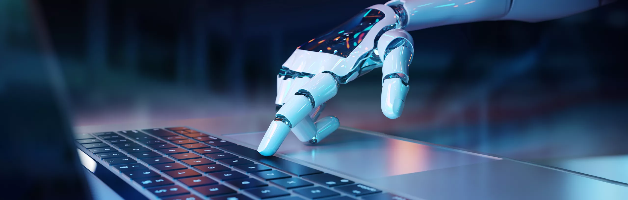 Ręka robotyczna obsługuje klawiaturę komputera.